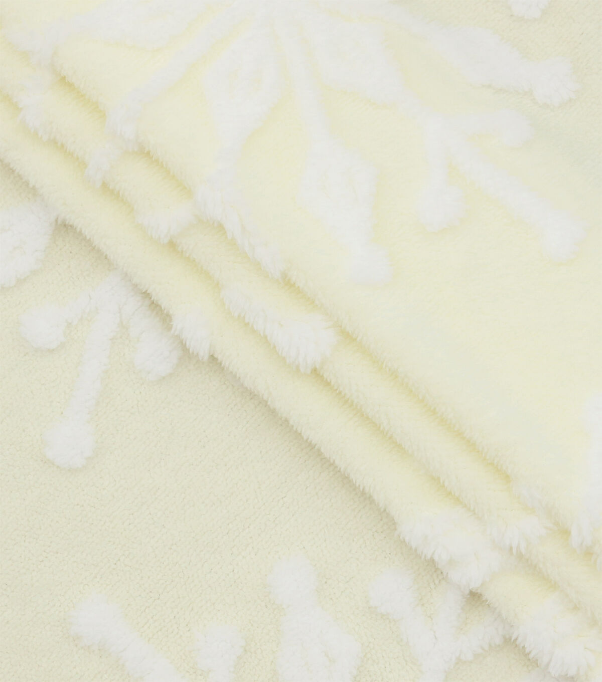 Debossed Snowflakes on Cream Sherpa Fabric