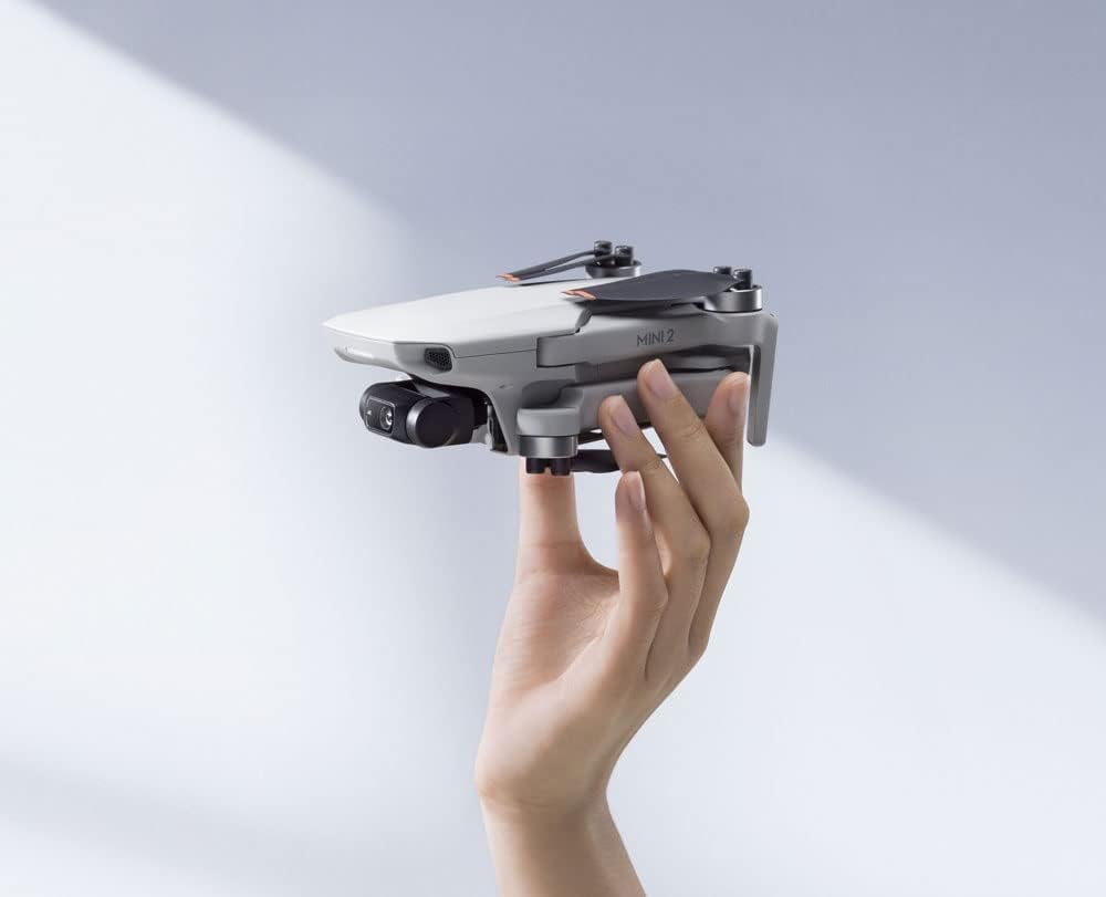 DJI Mini 2 – Ultralight and Foldable Drone Quadcopter, 3-Axis Gimbal with 4K Camera, 12MP Photo, 31 Mins Flight Time, OcuSync 2.0 10km HD Video Transmission, QuickShots, Gray