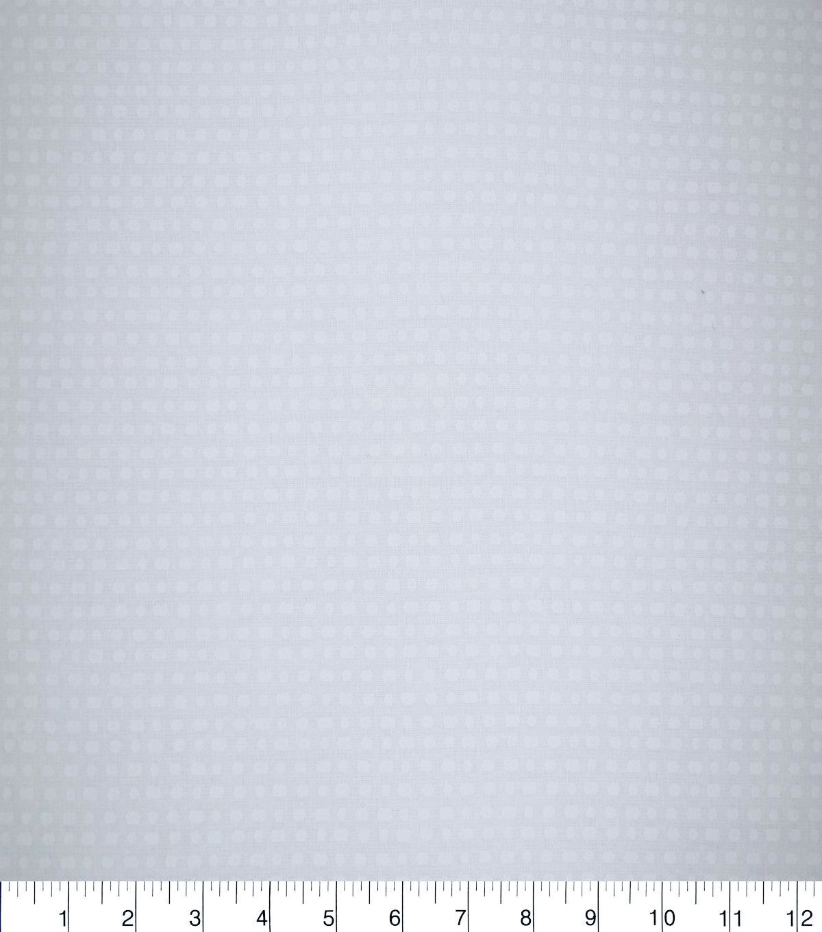 White Multi Sized Dots Quilt Cotton Fabric by Quilter's Showcase