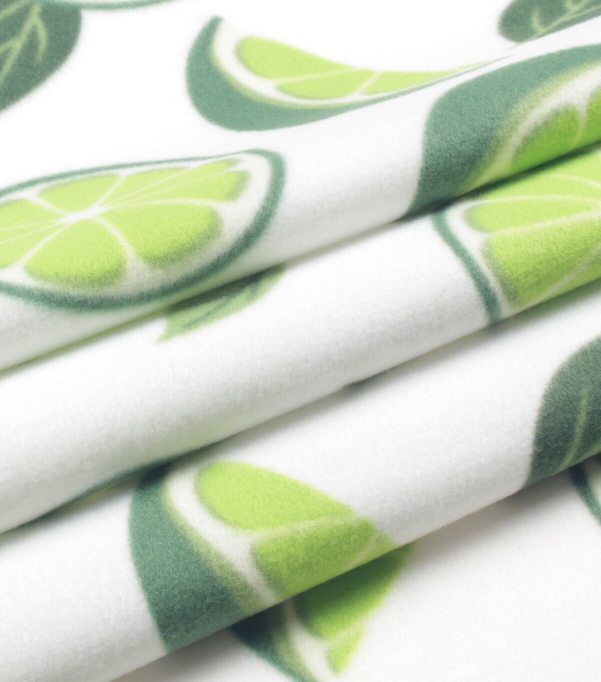 Bold Summer Lime Slices on White Blizzard Fleece Fabric