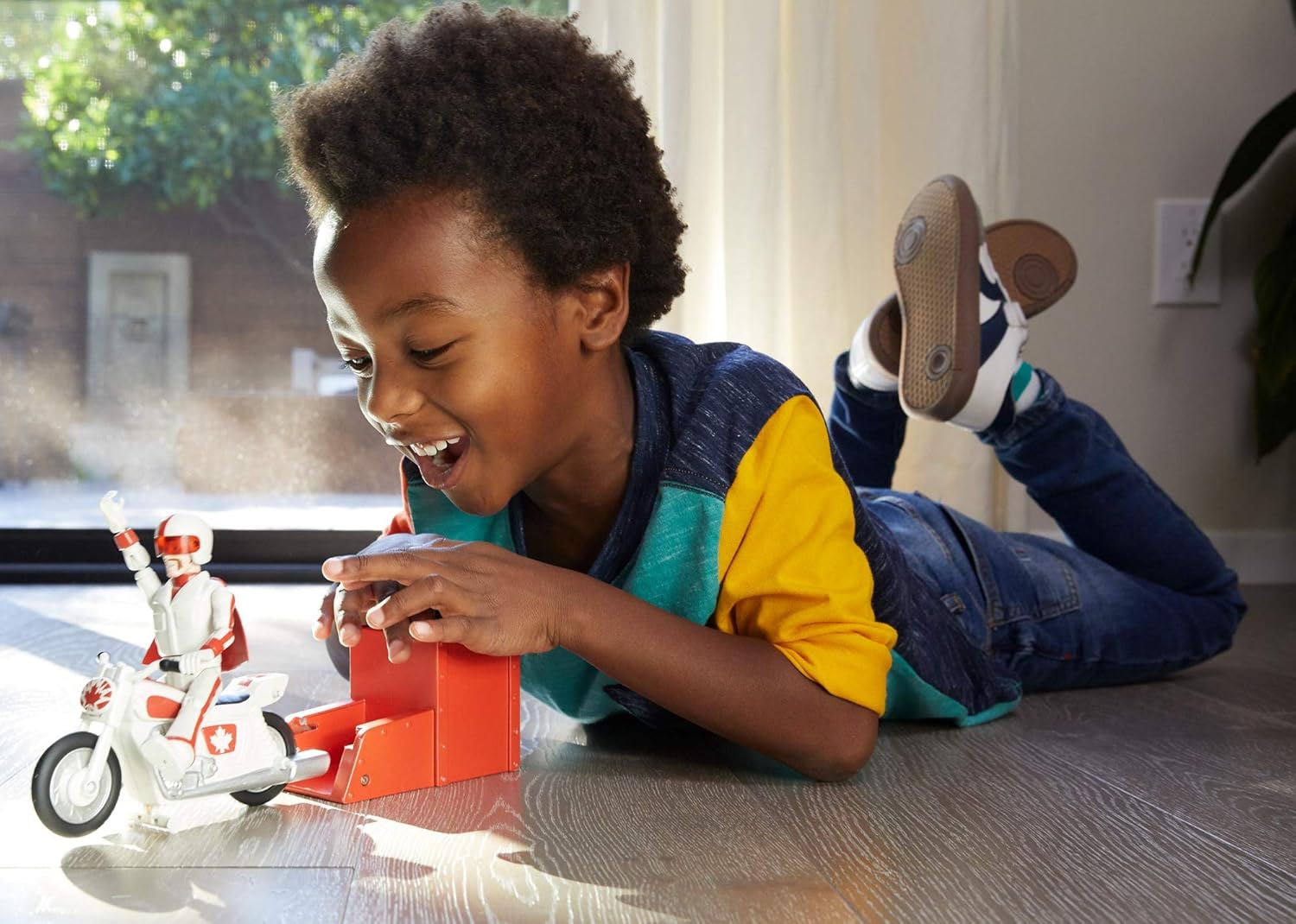 Disney Pixar Toy Story 4 Stunt Racer Duke Caboom Figure, 5.9 in, in Racing Outfit with Motorcycle and Launcher, Race Up to 15 ft and Perform Stunts, Gift for 3 Years and Older