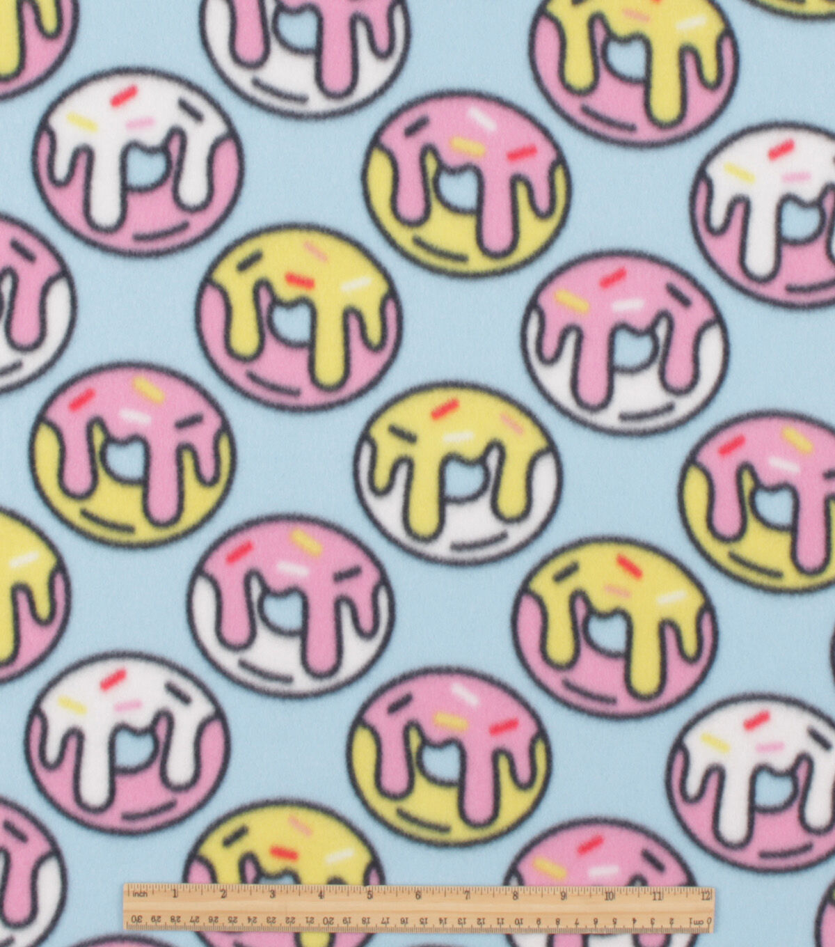 Cartoon Donuts on Blue Blizzard Fleece Fabric