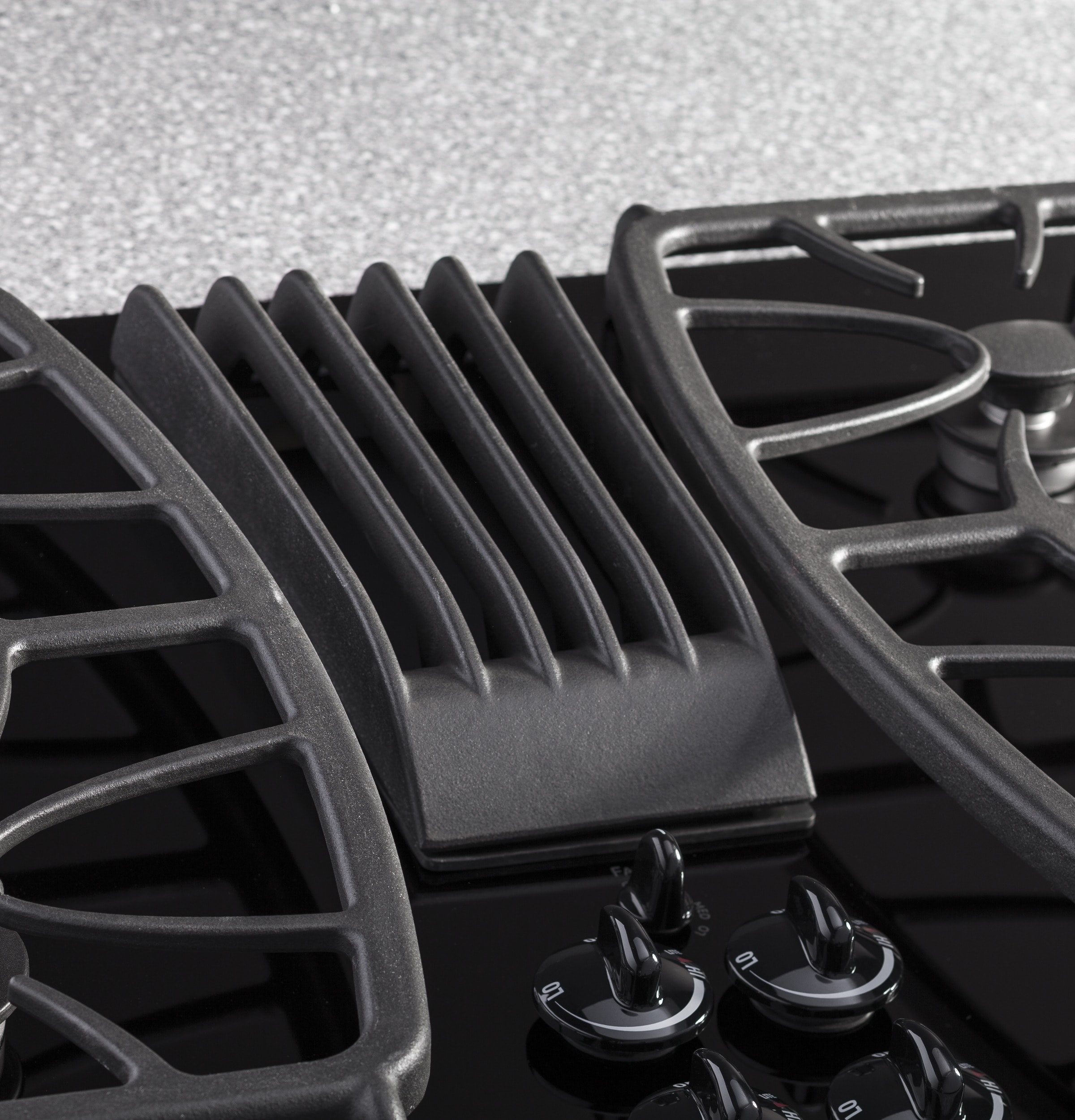 GE Profile 30-in 4 burners Black Gas Cooktop with Downdraft Exhaust