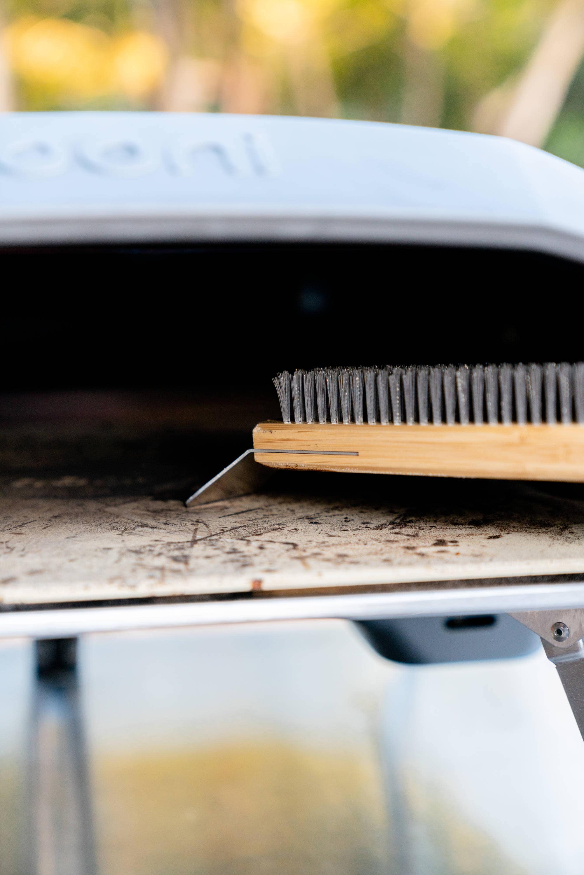 Ooni Grill brush with 23.5-in Wood Handle with Scraper Blade