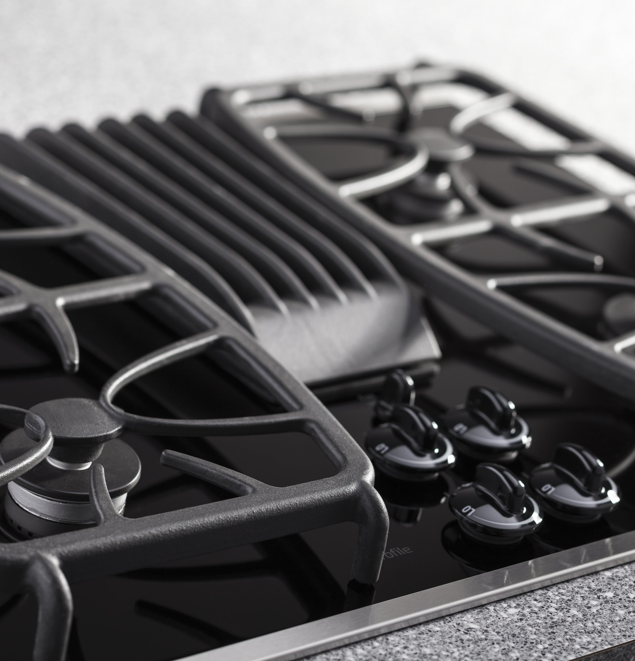 GE Profile 30-in 4 burners Black Gas Cooktop with Downdraft Exhaust
