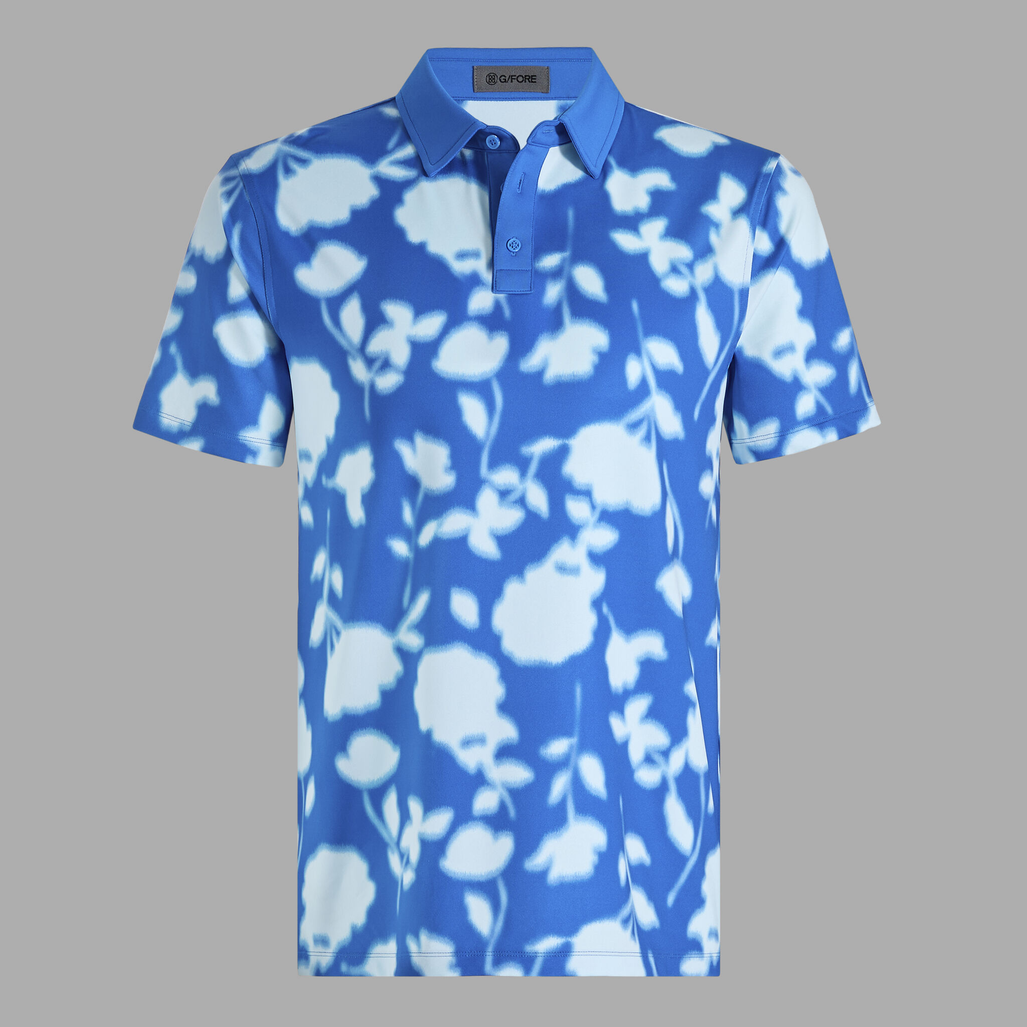 BLUR FLORAL TECH JERSEY POLO