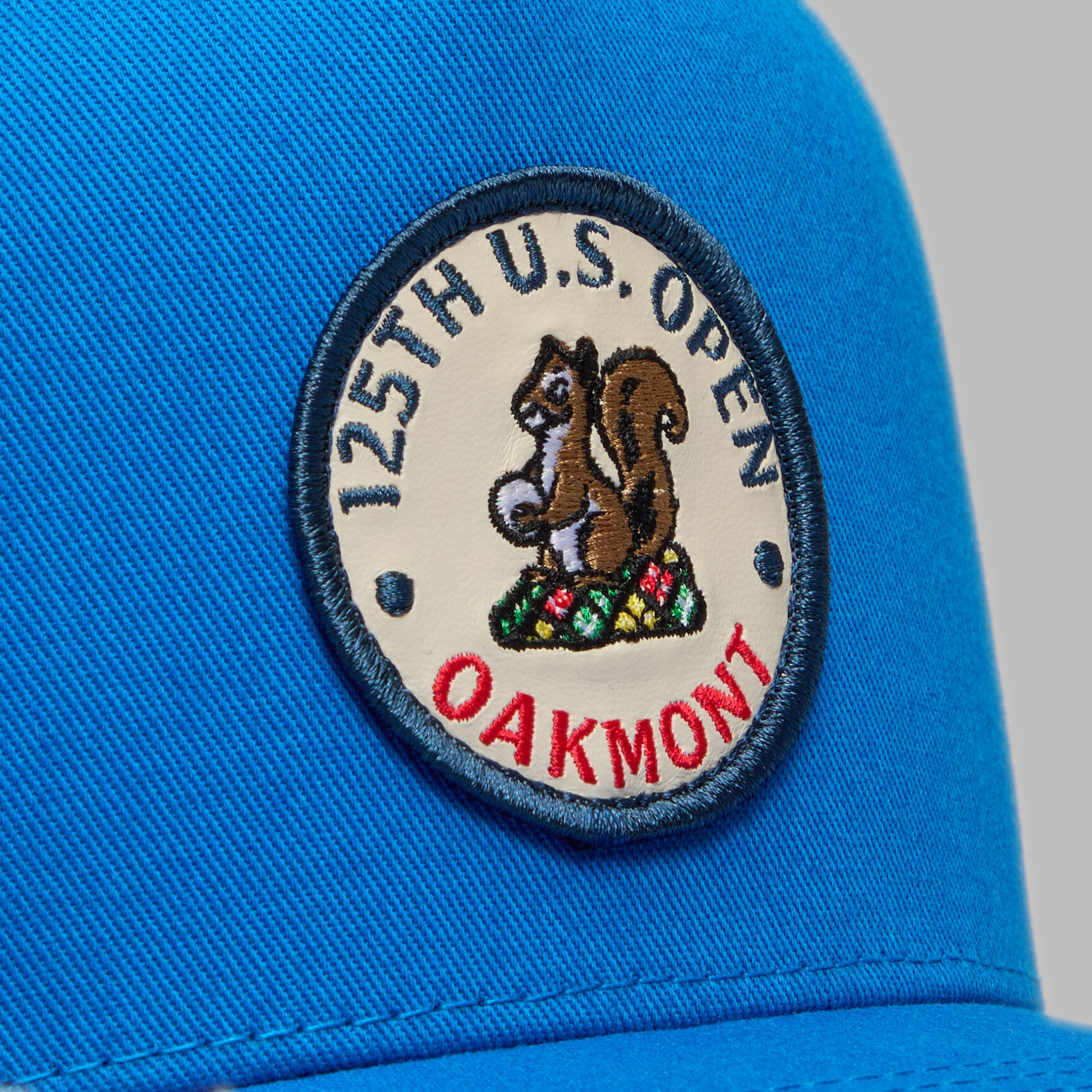 2025 U.S. OPEN CIRCULAR SQUIRREL PATCH TRUCKER HAT