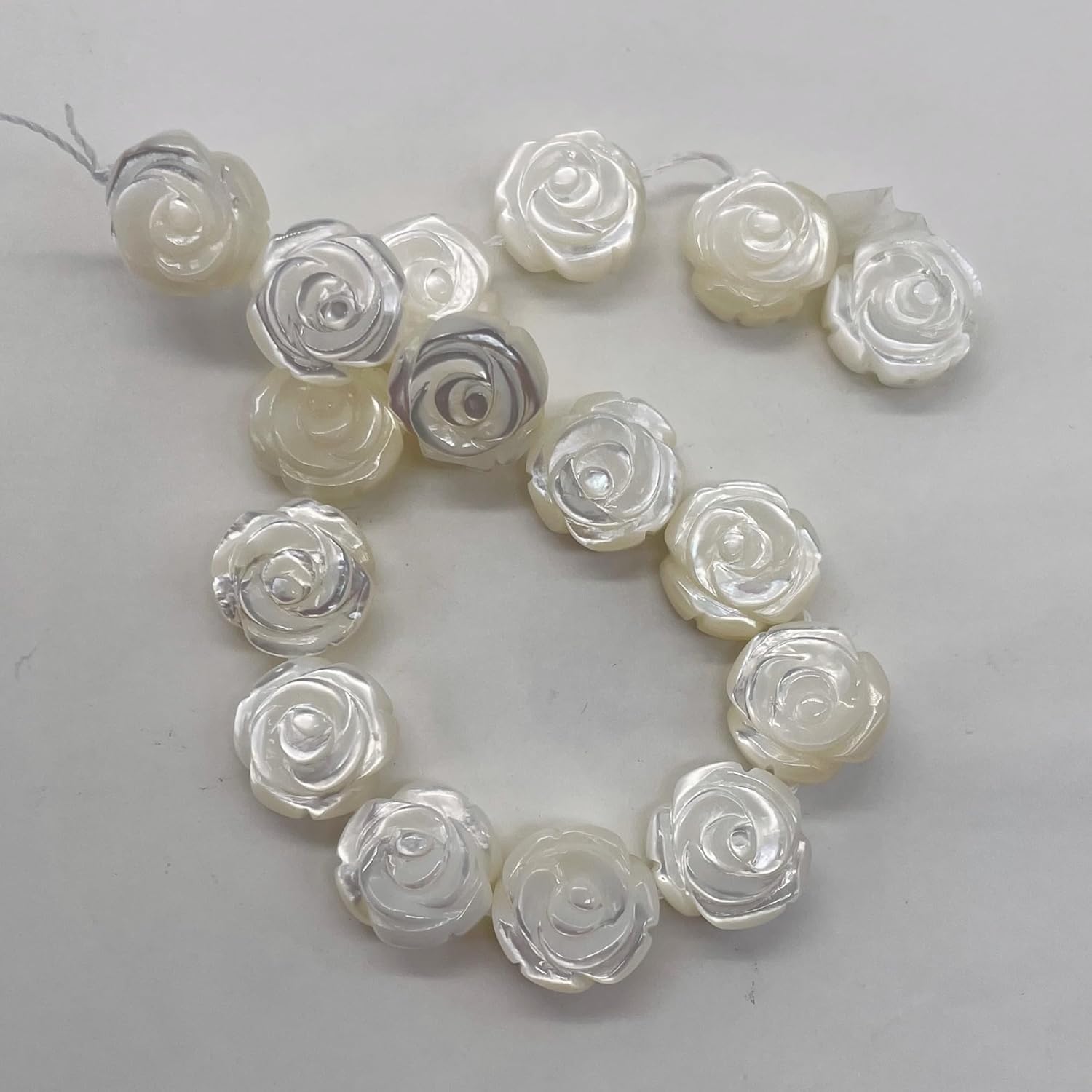 Generic Mother of Pearl Half Strand Carved Rose Beads | 12x6mm | White | 16 Beads |