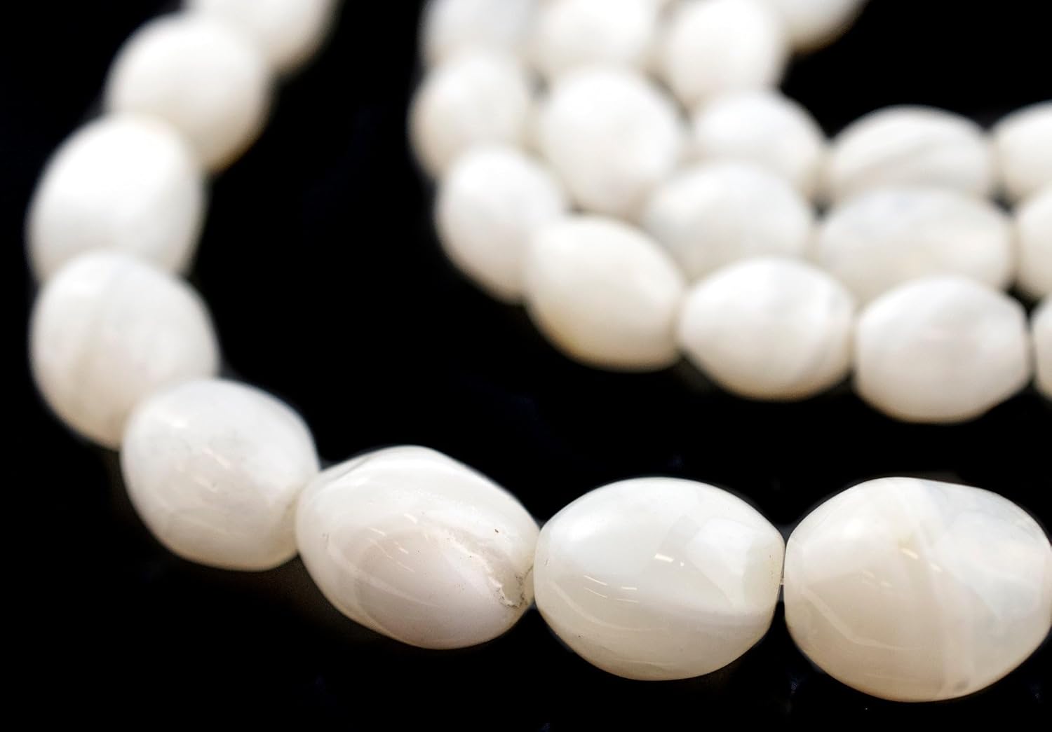 The Bead Chest Graduated Oval White Banded Agate Beads: Extra Long Strand for Elegant Jewelry Creations
