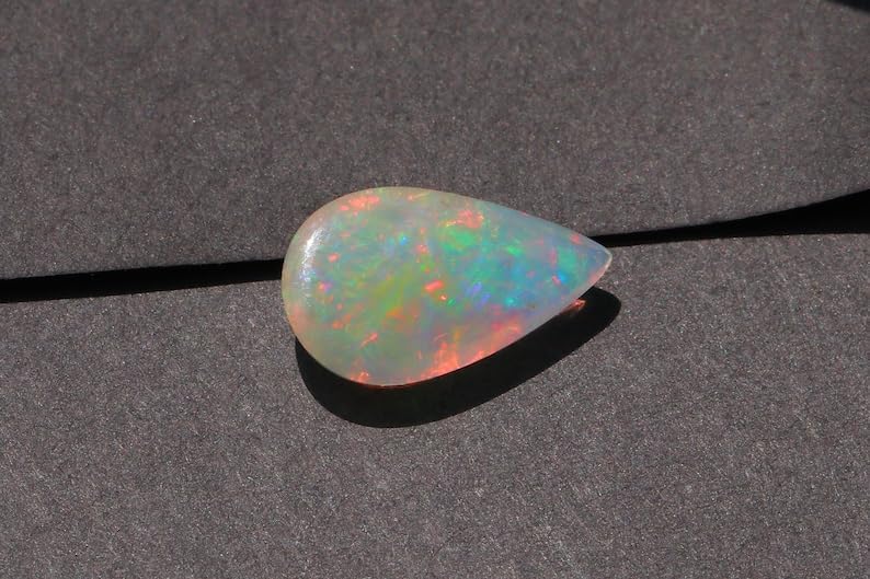 14.4x8.6x4.1mm Ethiopian Opal Cabochon AAA Quality Ethiopian Opal Pear Cabochon Ethiopian Opal Cabochon Natural welo opal multi fire opal loose Gemstone For Jewelry Making