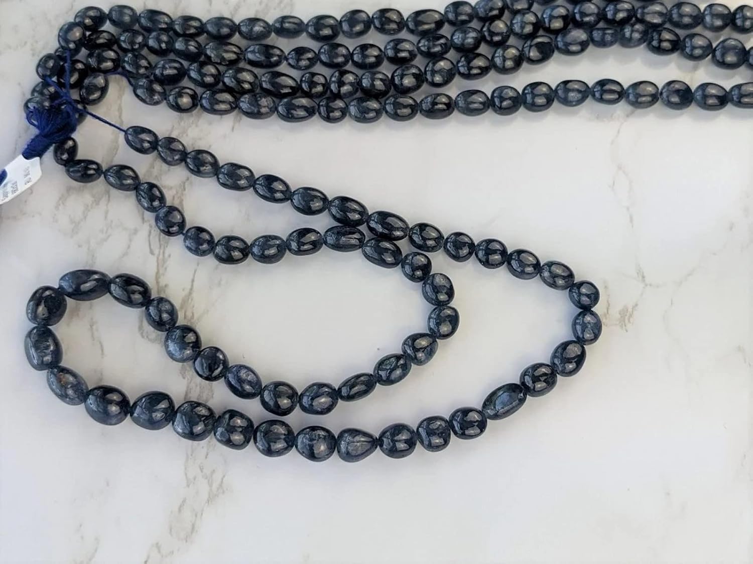 1 Strand Blue Sapphire 6x8mm - 8x10mm Smooth Ovals 16