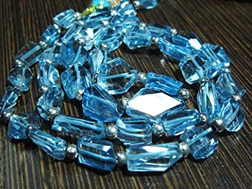 BEADS GEMSTONE 130 carat-AAA Blue Topaz Step Cut Nuggets- 19 Inch Long Strand -Stones measure- 6-10mm long. Code-HIGH-7858