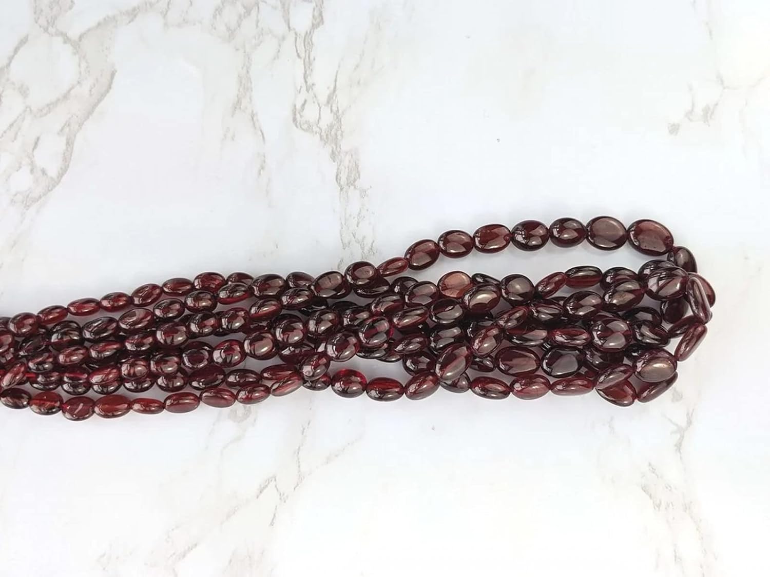 1 Strand Red Garnet 6x4mm - 9x7mm Smooth Ovals 16
