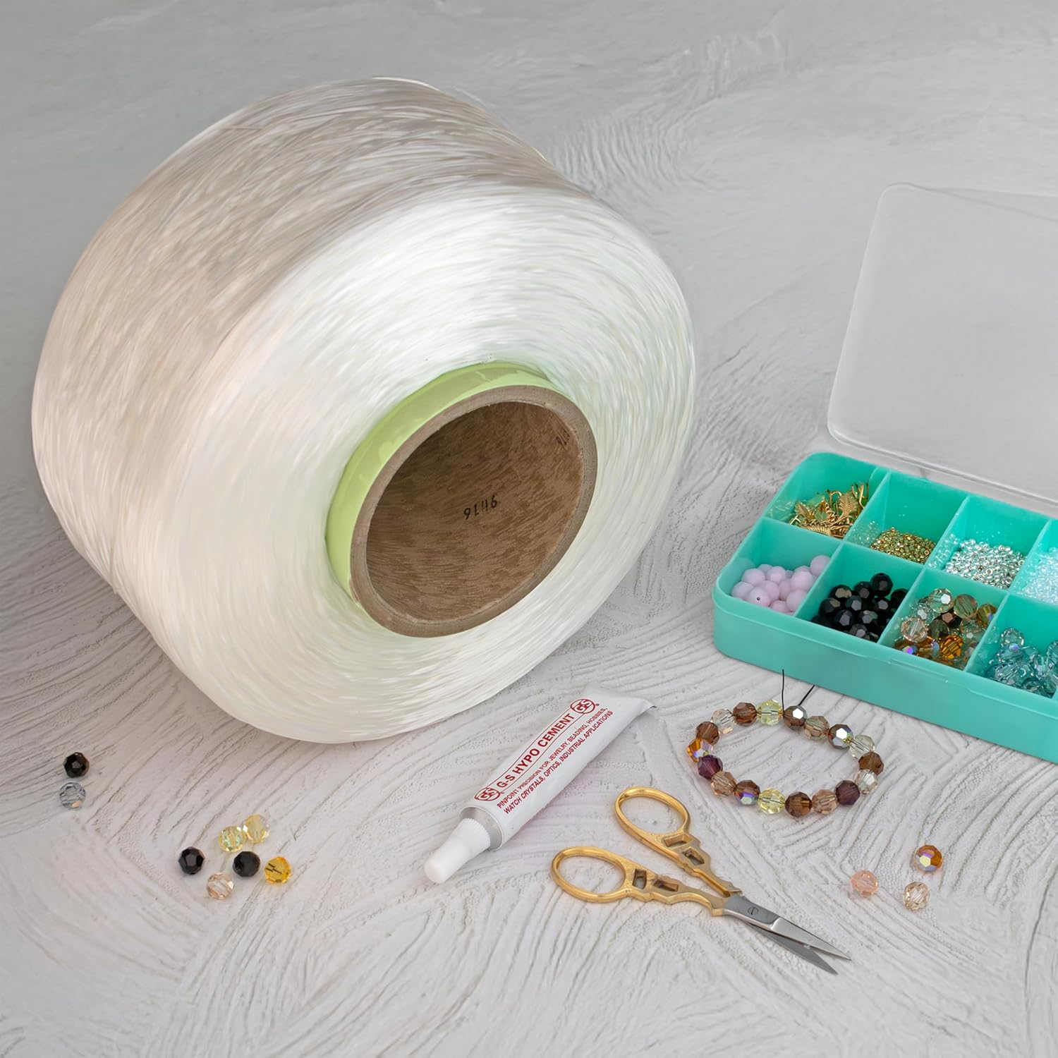 The Beadsmith Opelon Stretch Cord – Elastic Beading Fiber, White, 0.7 mm Diameter, 4400 Meters (14436 ft) Spool