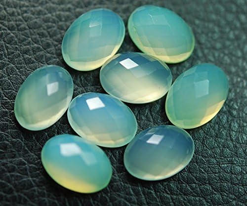 2 matched pair,quality,light prenite chalcedony feceted oval shape briolettes 10x14mm approx