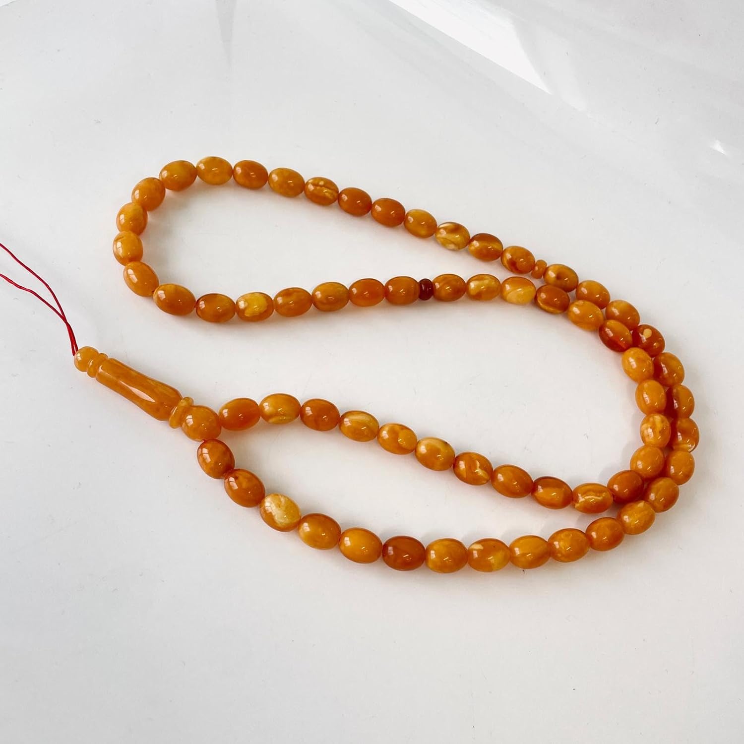 AMBERSTONE Muslim Prayer Beads Tasbih - Premium Handmade Baltic Amber Tasbeeh for Dhikr - Natural Orange Amber Islamic Rosary Misbaha Subha - 66 Beads / 41.8 g