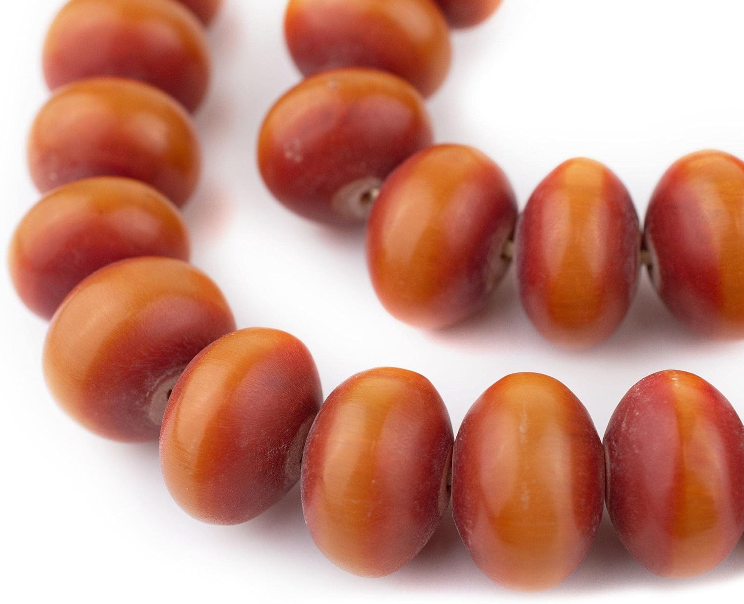 The Bead Chest Auburn Kenya Amber Resin Saucer Beads (25mm)