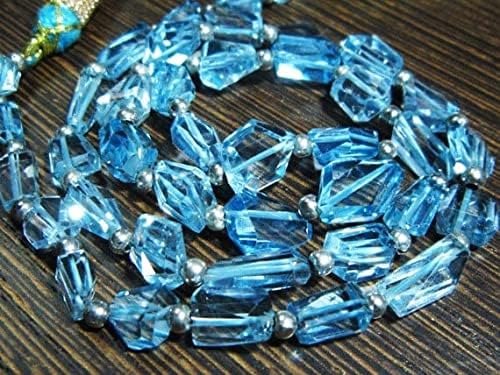 BEADS GEMSTONE 120 carat-AAA Blue Topaz Step Cut Nuggets- 17 Inch Long Strand -Stones measure- 7-11mm long. Code-HIGH-8016