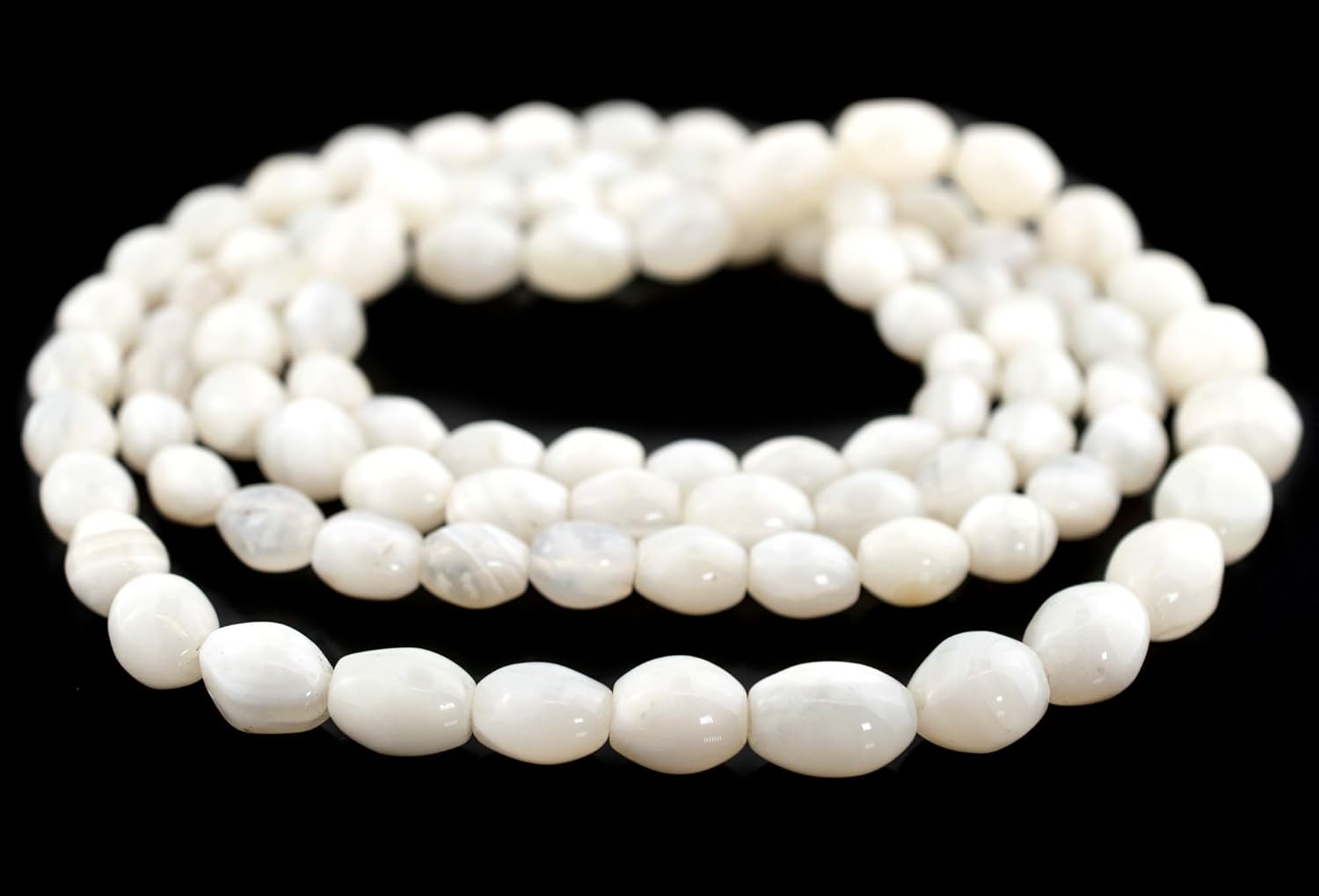 The Bead Chest Graduated Oval White Banded Agate Beads: Extra Long Strand for Elegant Jewelry Creations