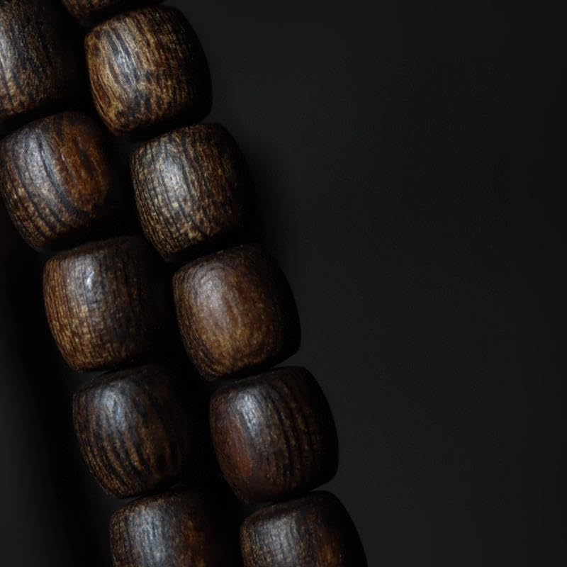 Hainan Soft-Fiber Black Agarwood 8mm*108 Beads Barrel-Shaped Old Wood Dominant Aroma with Bold, Outward-Projecting Scent Distinctive Grain Pattern