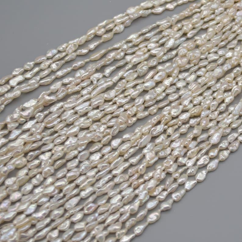 13 inch Strand of Natural gem Freshwater White Biwa Souffle Pearl, 10x4-6mm Biwa Souffle Smooth Beads for DIY Jewelry Making. | Beads_03709