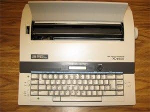 Rebuilt Discontinued Smith Corona XD 6600 Typewriters by Around The Office with New Machine Guarantee, Extra Ribbons & Correction Tapes, and Dust Cover