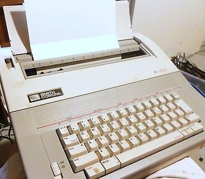 Rebuilt Discontinued Smith Corona XL 1800 Typewriters by Around The Office with New Machine Guarantee, Extra Ribbons & Correction Tapes, and Dust Cover