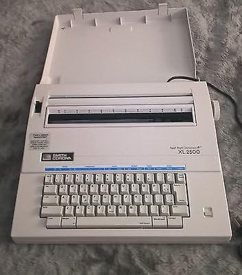Rebuilt Discontinued Smith Corona XL 2500 Typewriters by Around The Office with New Machine Guarantee, Extra Ribbons & Correction Tapes, and Dust Cover