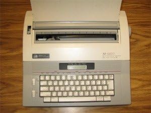 Rebuilt Discontinued Smith Corona XD 4900 Typewriters by Around The Office with New Machine Guarantee, Extra Ribbons & Correction Tapes, and Dust Cover