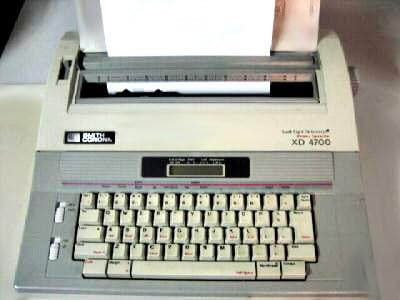 Rebuilt Discontinued Smith Corona XD 4700 Typewriters by Around The Office with New Machine Guarantee, Extra Ribbons & Correction Tapes, and Dust Cover