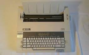 Rebuilt Discontinued Smith Corona XD 8000 Typewriters by Around The Office with New Machine Guarantee, Extra Ribbons & Correction Tapes, and Dust Cover