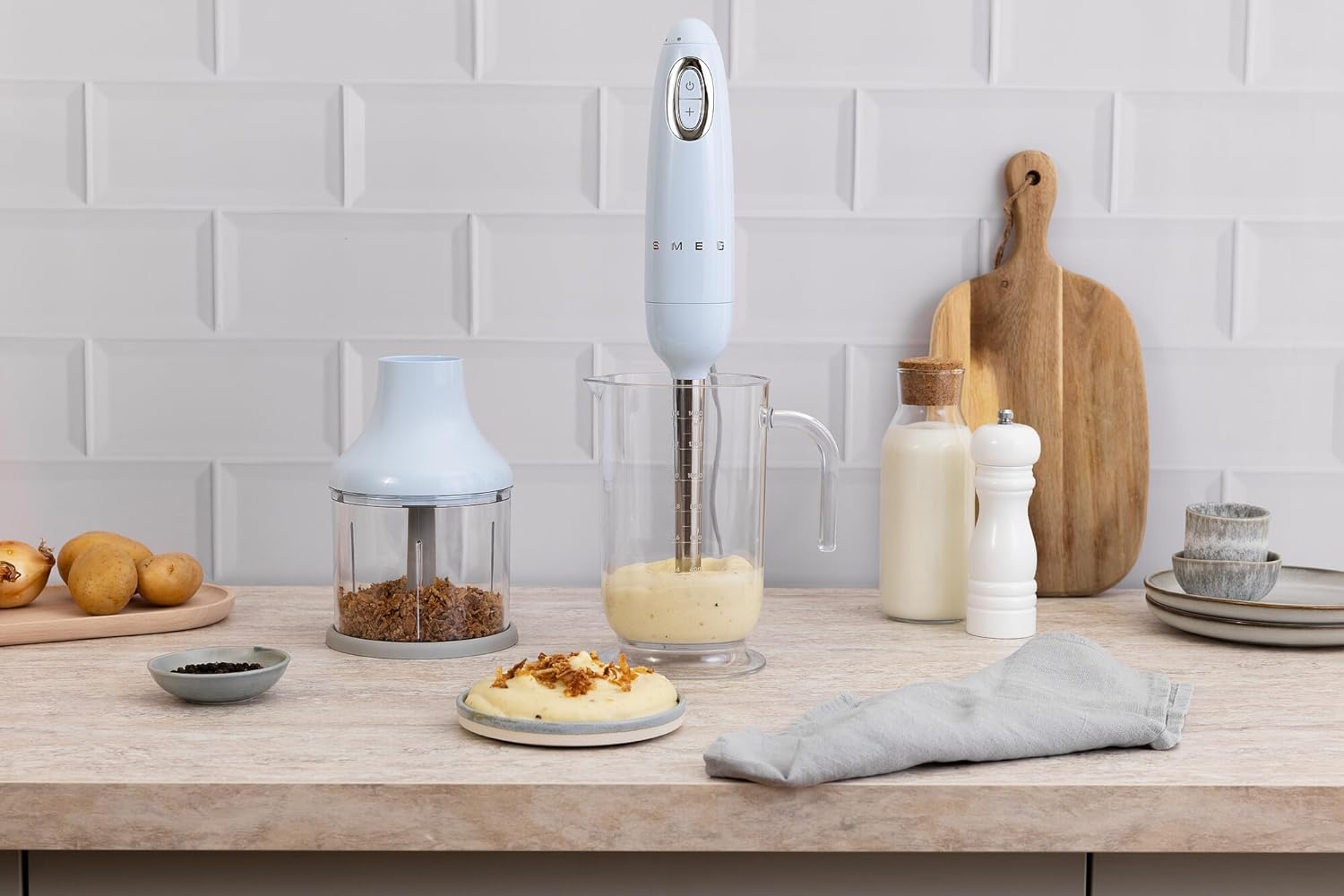 SMEG Handheld Immersion Blender with Beaker, Chopping Bowl w/Lid, Wire Whisk, 5 Speed Controls, made with Stainless Steel Blades and Ergonomic Design (Pastel Blue)