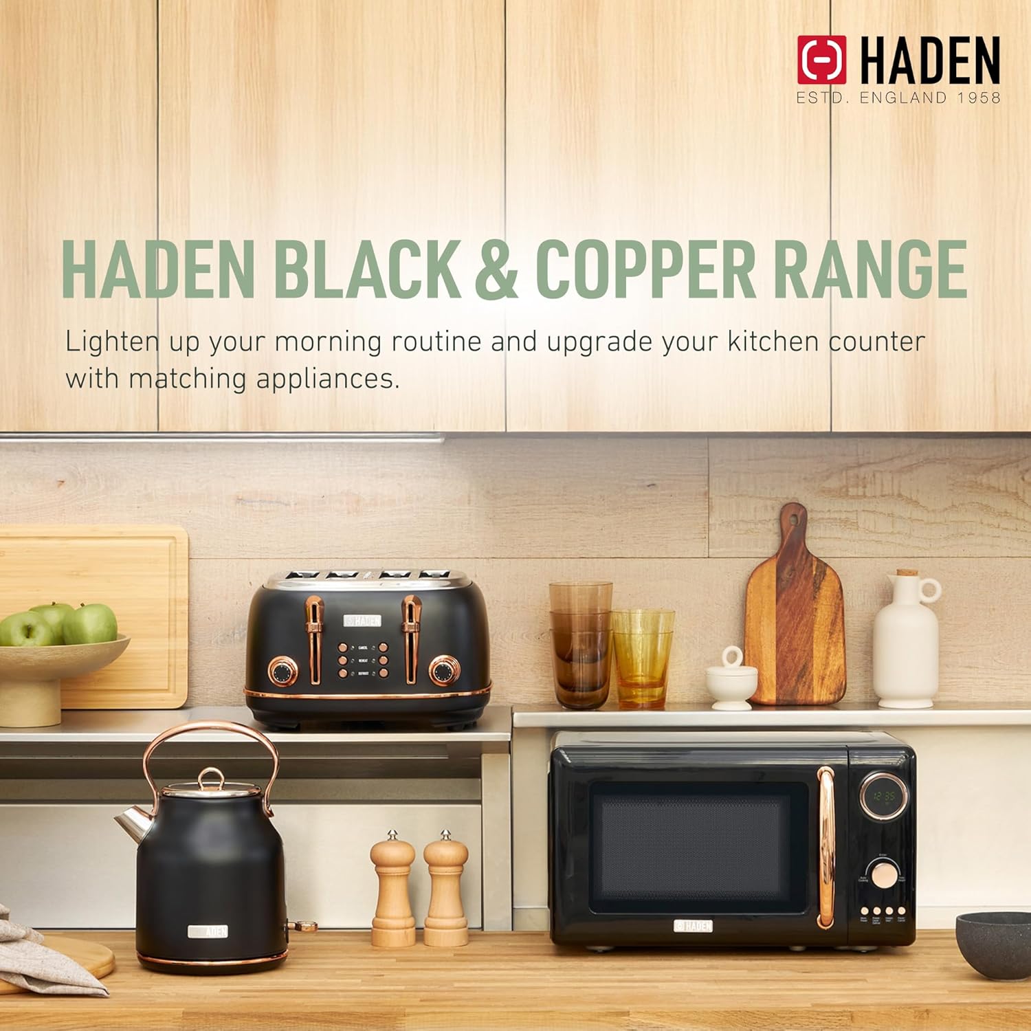 Haden 700 Watt 0.7 Cubic Foot Microwave Oven with Digital Controls, Defrost, and Instant Start Countertop Small Appliance, Black/Copper