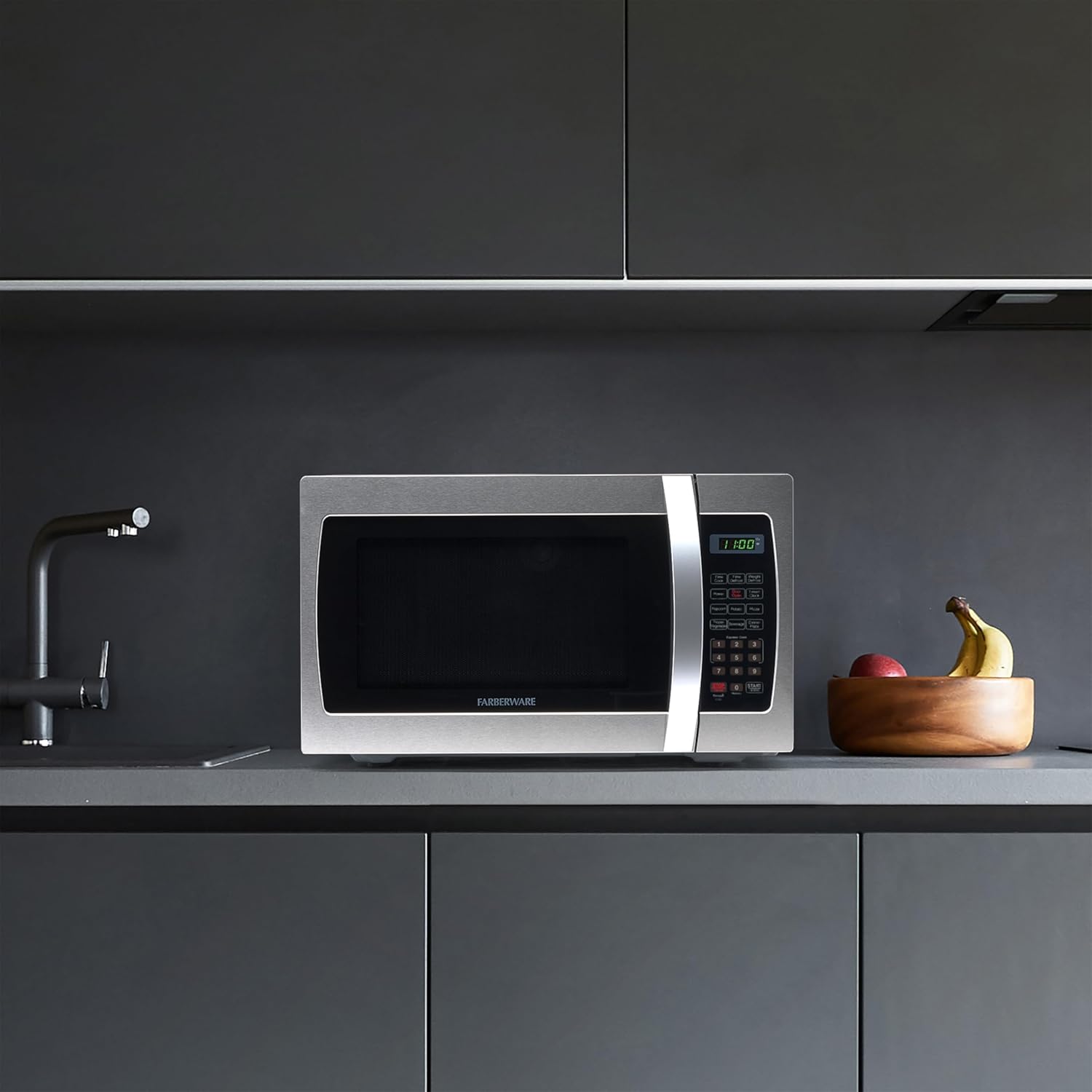 Farberware 1.3 Cu. Ft. Countertop Microwave Oven – 1000 Watts Power, Auto Cook Settings, Defrost, Easy Clean and Child Safety Lock - Stainless