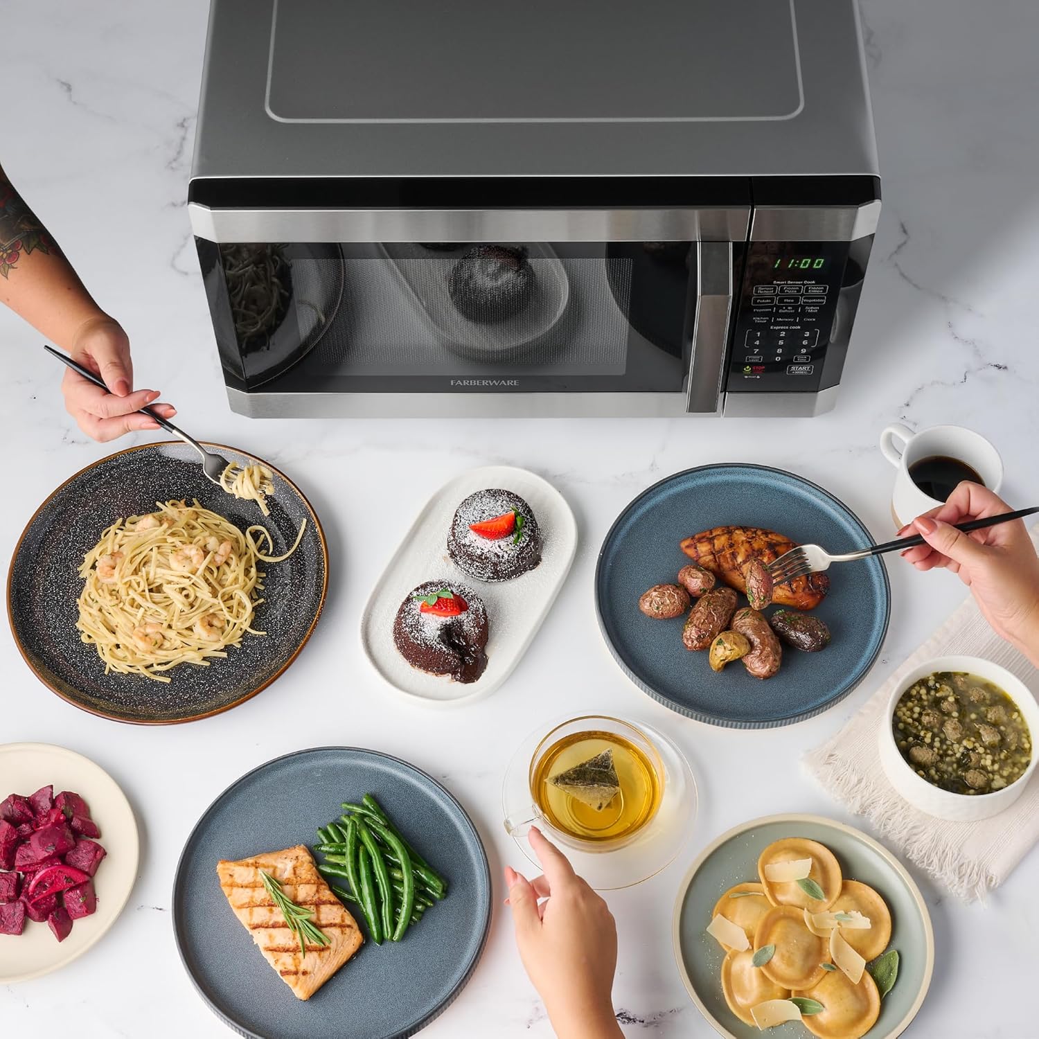 Farberware 1.6 Cu. Ft. Countertop Microwave Oven – 1100 Watts Power, Smart Sensor Auto Cook Settings, Defrost, Easy Clean and Child Safety Lock - Stainless