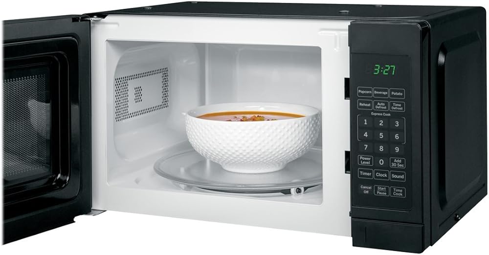 GE Countertop Microwave Oven | Includes Optional Hanging Kit | 0.7 Cubic Feet Capacity, 700 Watts | Kitchen Essentials for the Countertop | Black