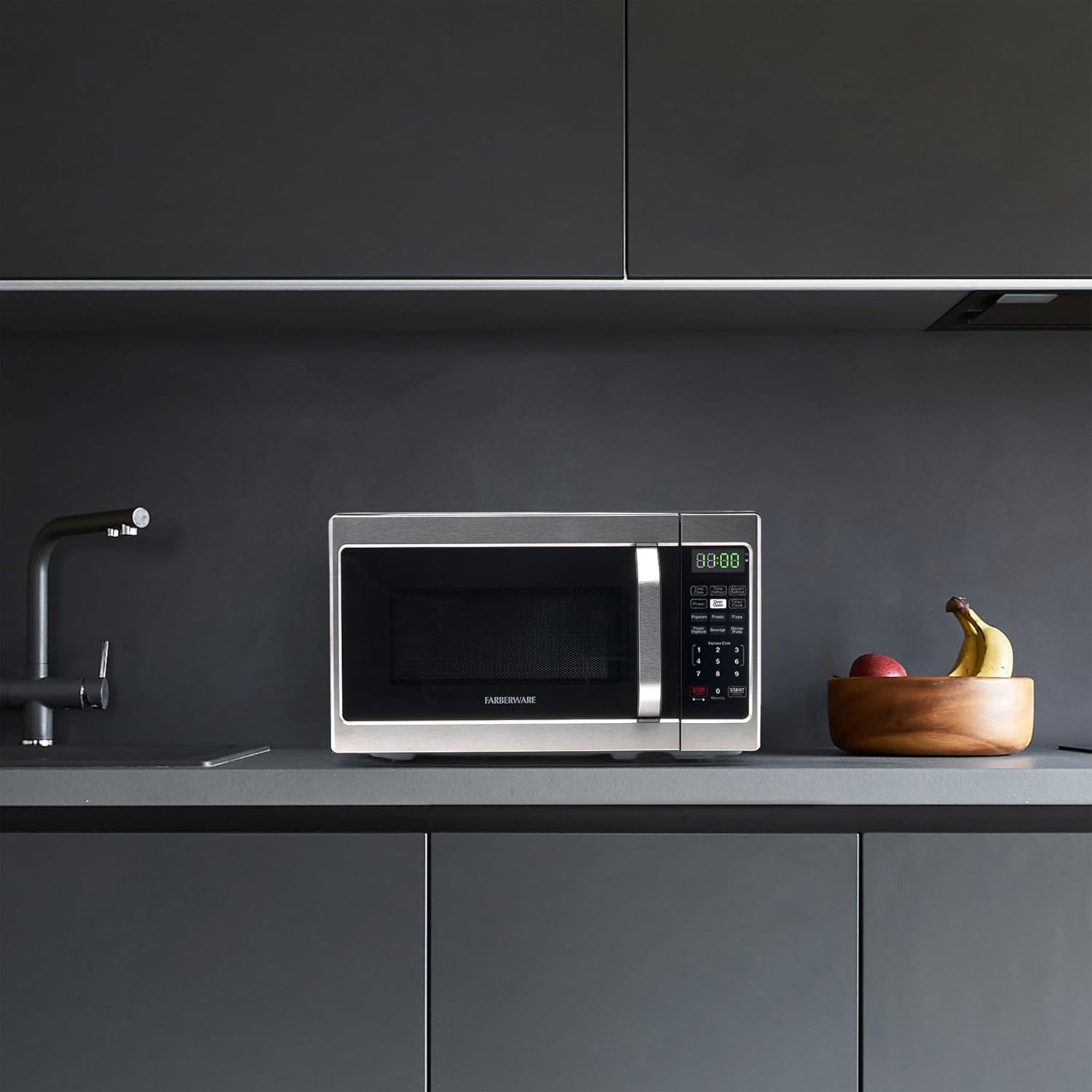 Farberware 0.7 Cu. Ft. Countertop Microwave Oven – 700 Watts Power, Auto Cook Settings, Defrost, Easy Clean and Child Safety Lock - Stainless