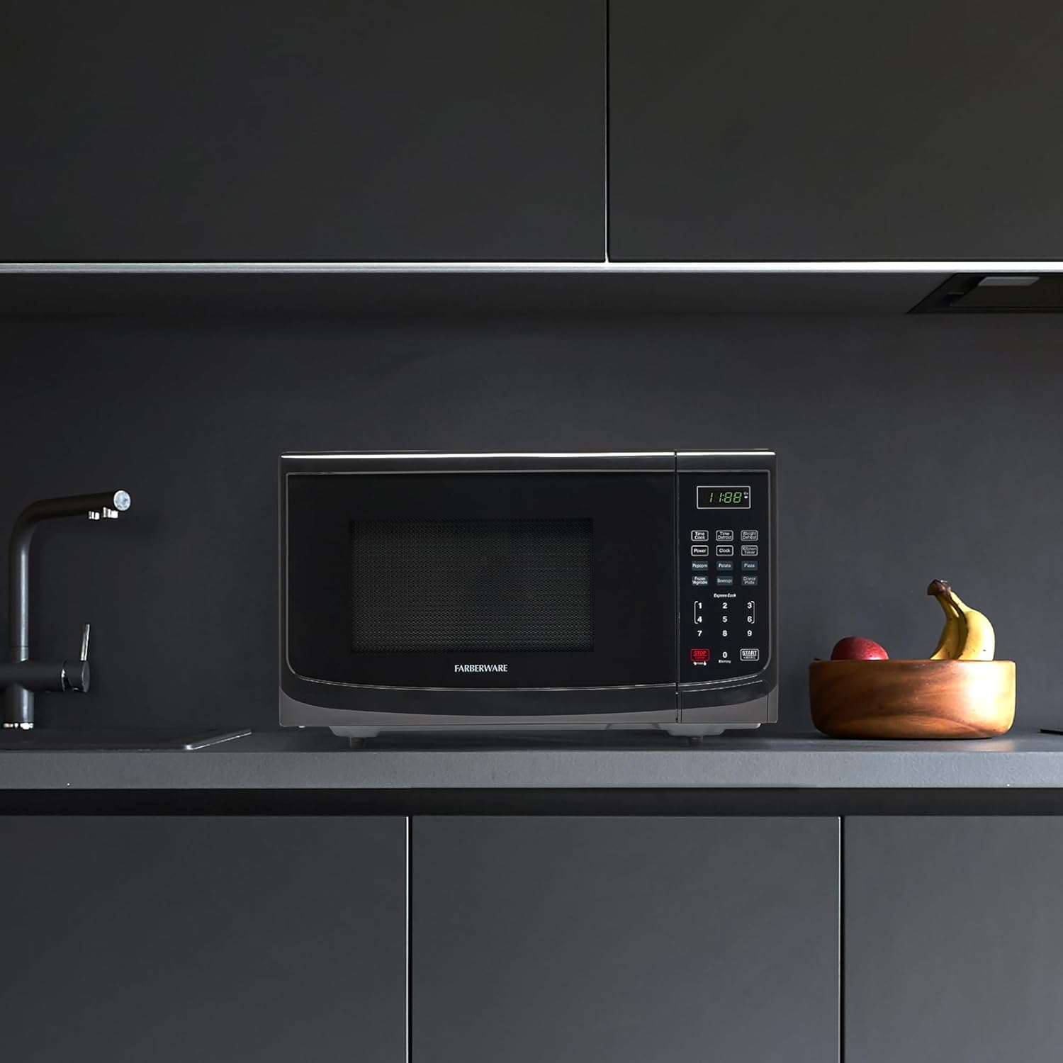 Farberware 0.9 Cu. Ft. Countertop Microwave Oven – 900 Watts Power, Auto Cook Settings, Defrost, Easy Clean and Child Safety Lock - Black