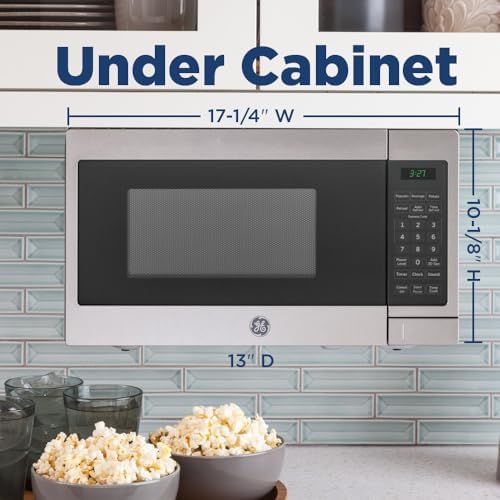 GE Spacemaker Countertop Microwave Oven, 0.7 Cu. FT, 700W with Removable Turntable, 6 Auto Menus, Instant On Controls, Easy Auto or Manual Defrost, Optional Hanging Kit, Stainless Steel