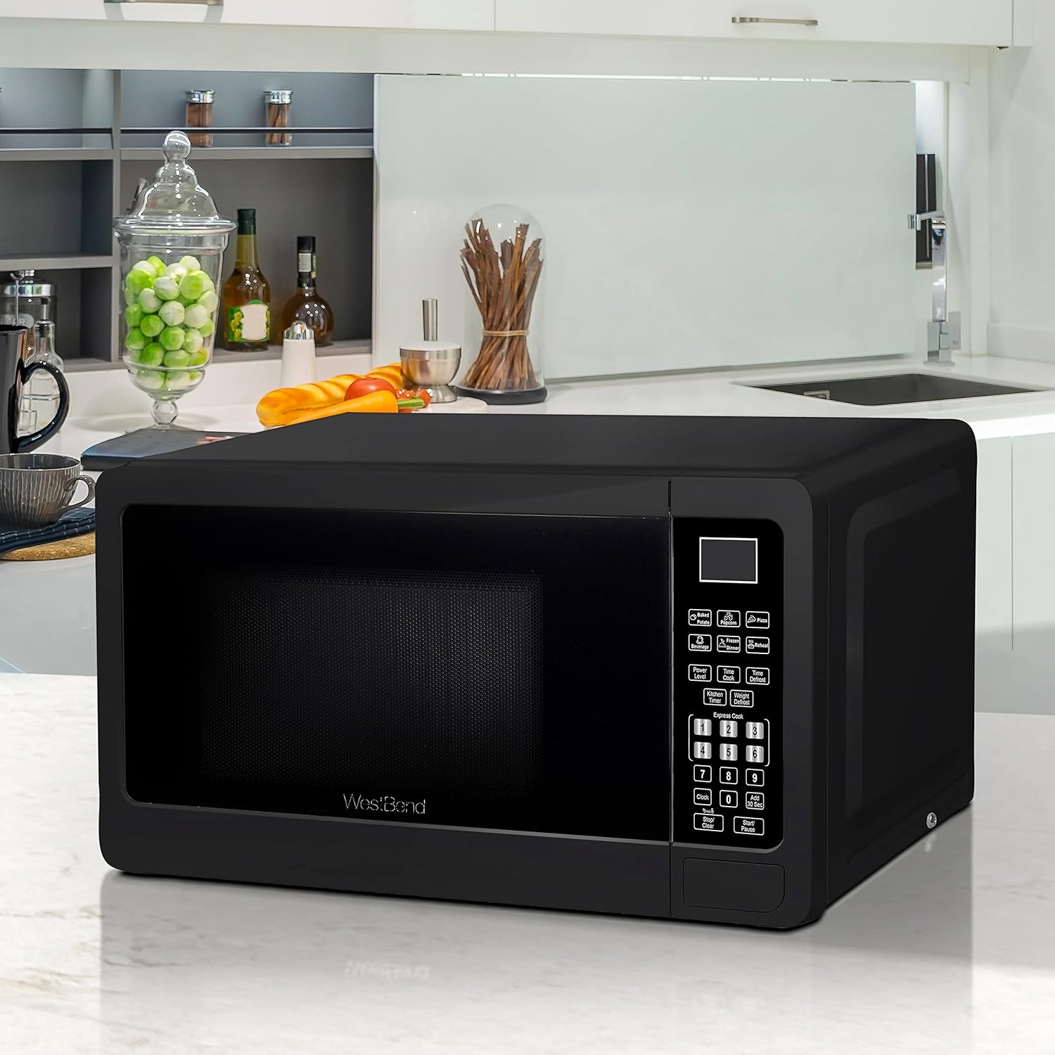West Bend Microwave Oven 700-Watts Compact with 6 Pre-Set Cooking Settings, Speed Defrost, Electronic Control Panel and Glass Turntable, 0.7 Cu.Ft., Black