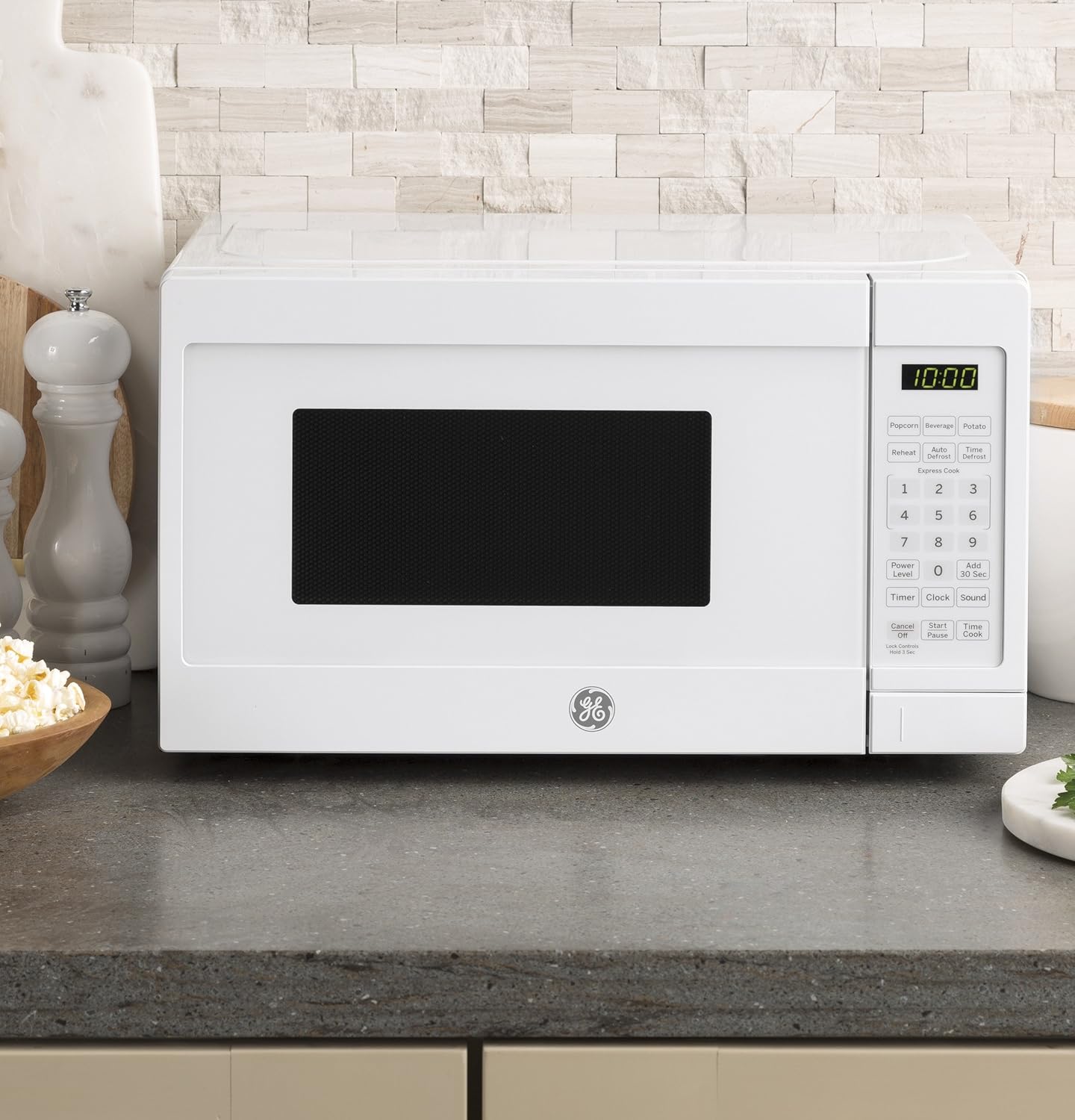 GE Countertop Microwave Oven | 0.7 Cubic Feet Capacity, 700 Watts | Kitchen Essentials for the Countertop or Dorm Room | White