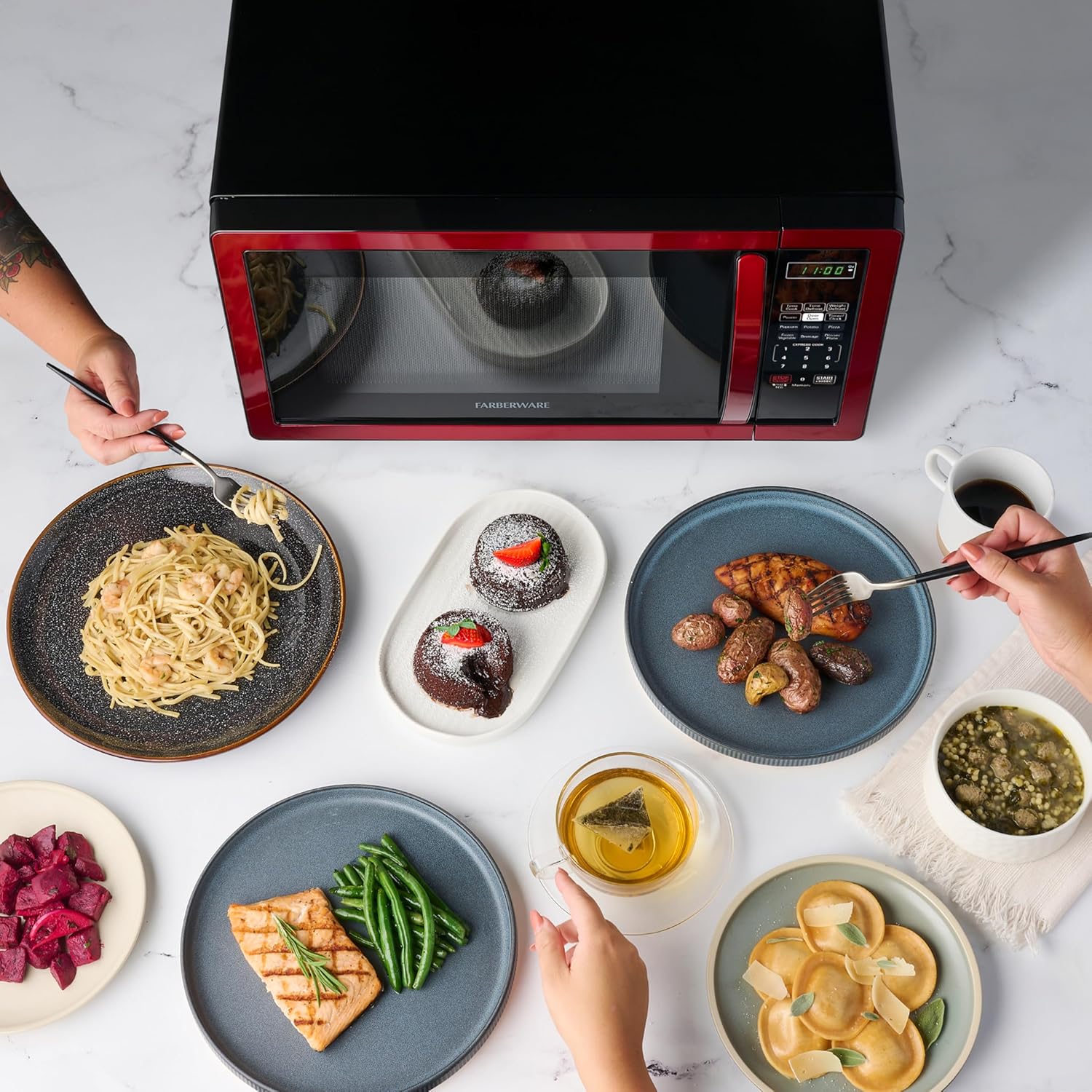 Farberware 1.1 Cu. Ft. Countertop Microwave Oven – 1000 Watts Power, Auto Cook Settings, Defrost, Easy Clean and Child Safety Lock - Metallic Red