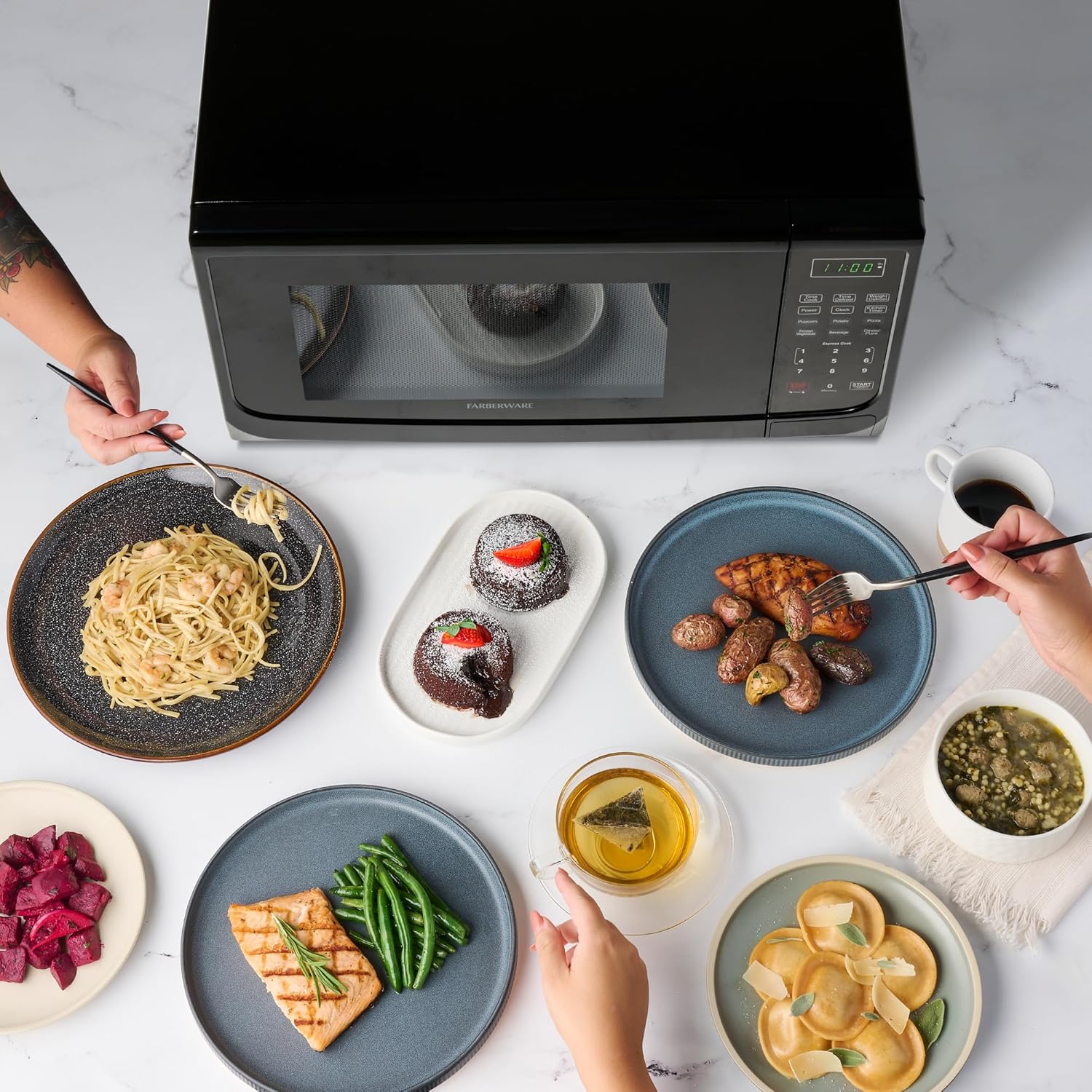 Farberware 1.1 Cu. Ft. Countertop Microwave Oven – 1000 Watts Power, Auto Cook Settings, Defrost, Easy Clean and Child Safety Lock - Black