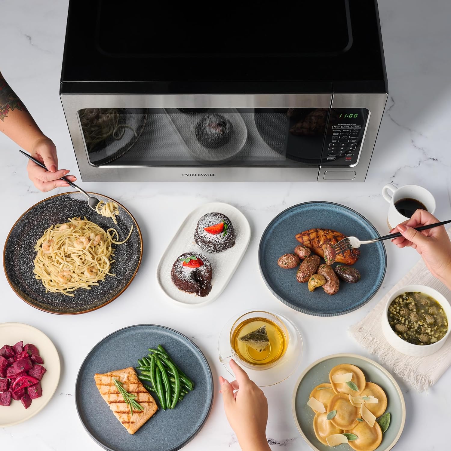 Farberware 2.2 Cu. Ft. Countertop Microwave Oven – 1100 Watts Power, Smart Sensor Auto Cook Settings, Defrost, Easy Clean and Child Safety Lock - Stainless