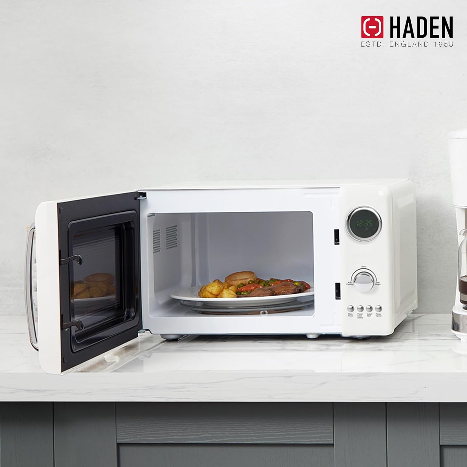 Haden 700 Watt 0.7 Cubic Foot Microwave Oven with Digital Controls, Defrost, and Instant Start Countertop Small Appliance, Ivory/Chrome