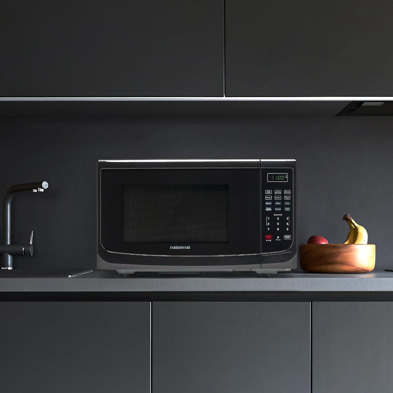 Farberware 1.1 Cu. Ft. Countertop Microwave Oven – 1000 Watts Power, Auto Cook Settings, Defrost, Easy Clean and Child Safety Lock - Black
