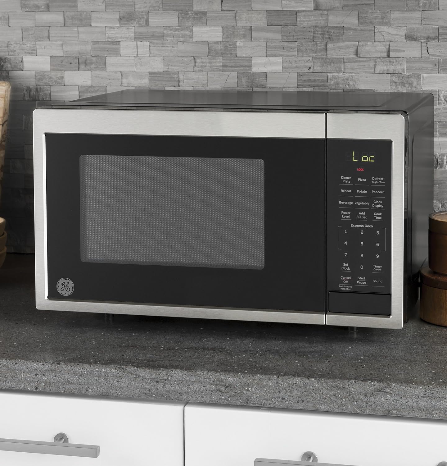GE Countertop Microwave Oven | 0.9 Cubic Feet Capacity, 900 Watts | Kitchen Essentials for the Countertop or Dorm Room | Stainless Steel