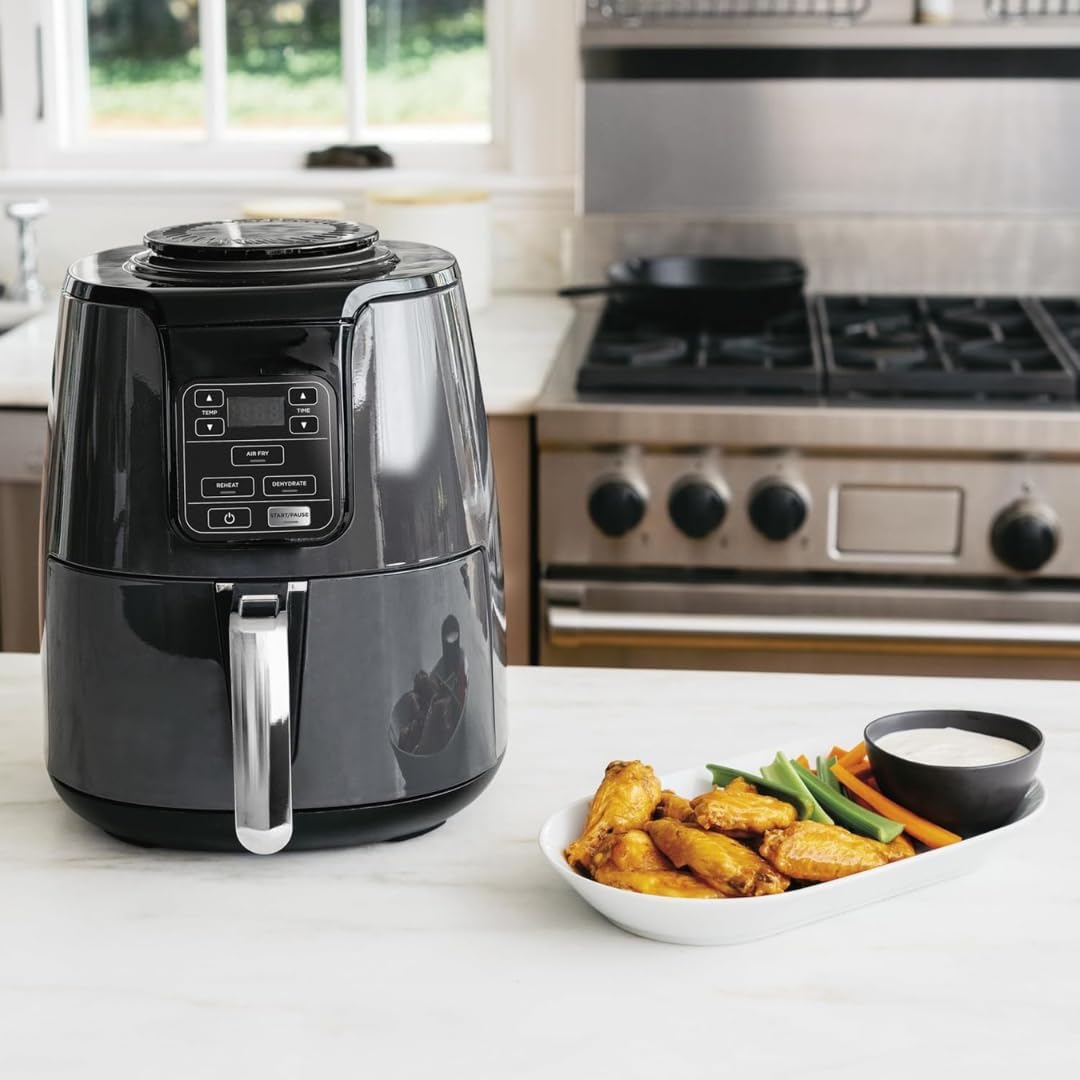 4 Quart AF100WM digital air fryer with cooking presets, wide temperature range and compact family size design