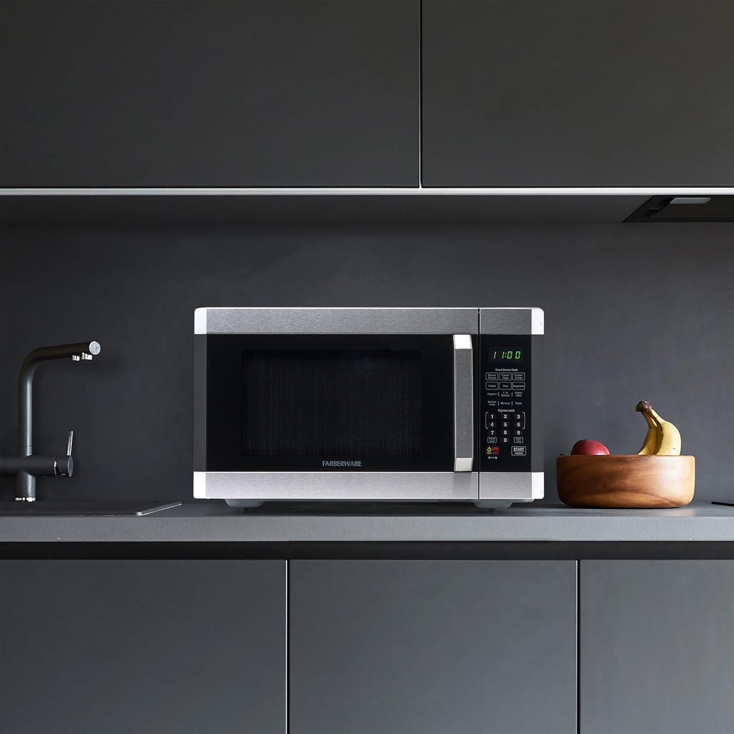 Farberware 1.6 Cu. Ft. Countertop Microwave Oven – 1100 Watts Power, Smart Sensor Auto Cook Settings, Defrost, Easy Clean and Child Safety Lock - Stainless