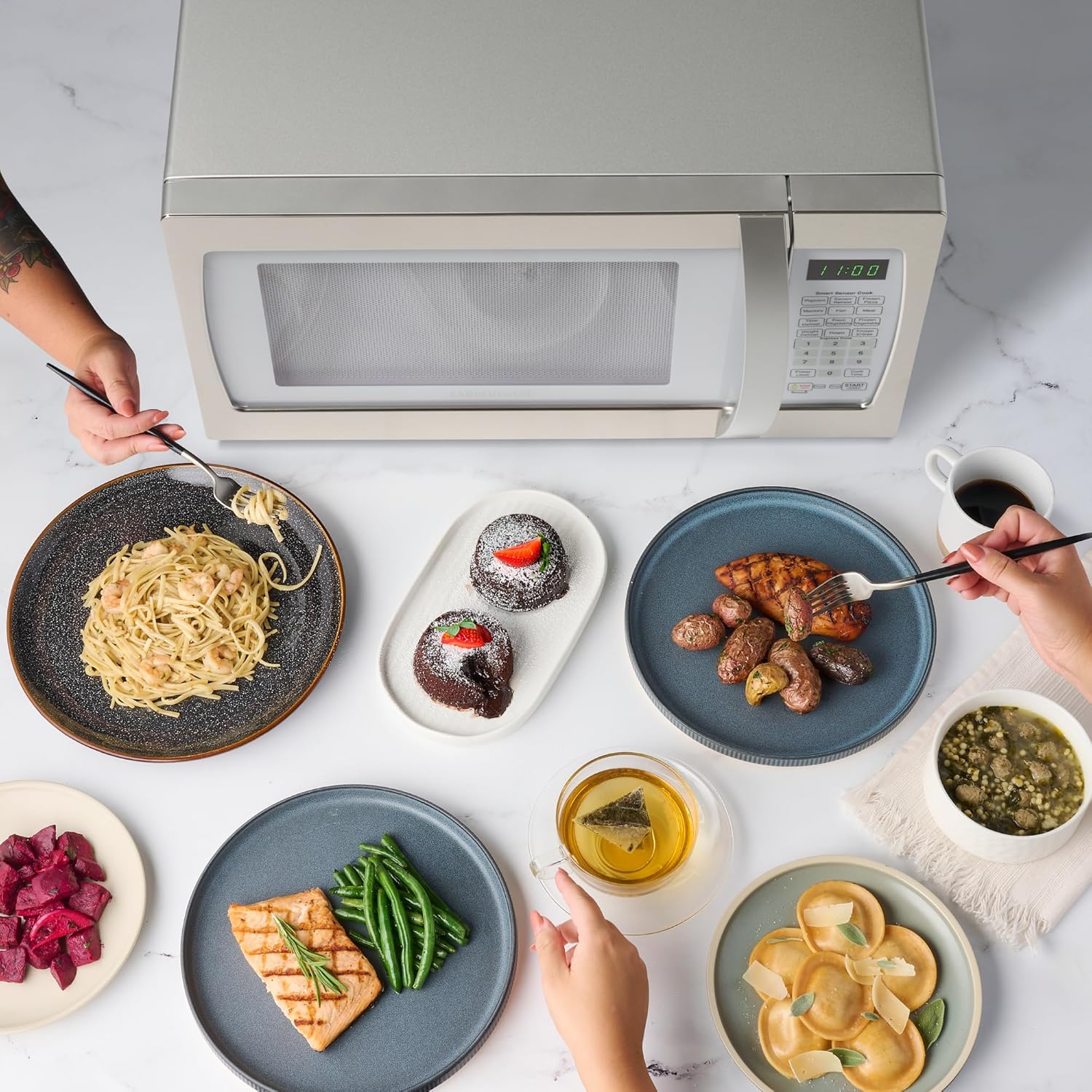 Farberware 1.3 Cu. Ft. Countertop Microwave Oven – 1100 Watts Power, Smart Sensor Auto Cook Settings, Defrost, Easy Clean and Child Safety Lock - White Platinum